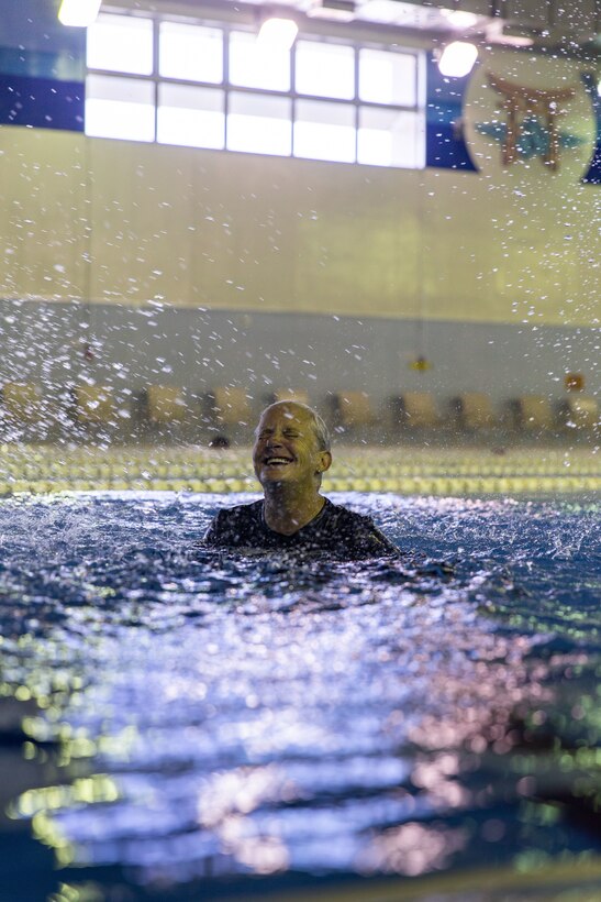 Jennifer Ayers, the Marine Corps Air Station Iwakuni aquatics director and a South Carolina native, poses for a portrait in the Marine Corps Community Services’ indoor pool on Sept. 4, 2024. Ayers and the MCAS Iwakuni aquatics team provide swim clinics and master classes, and train instructors with the goal to improve service members’ survival skills and increase their water confidence. (U.S. Marine Corps photo by Sgt. Phuchung Nguyen)