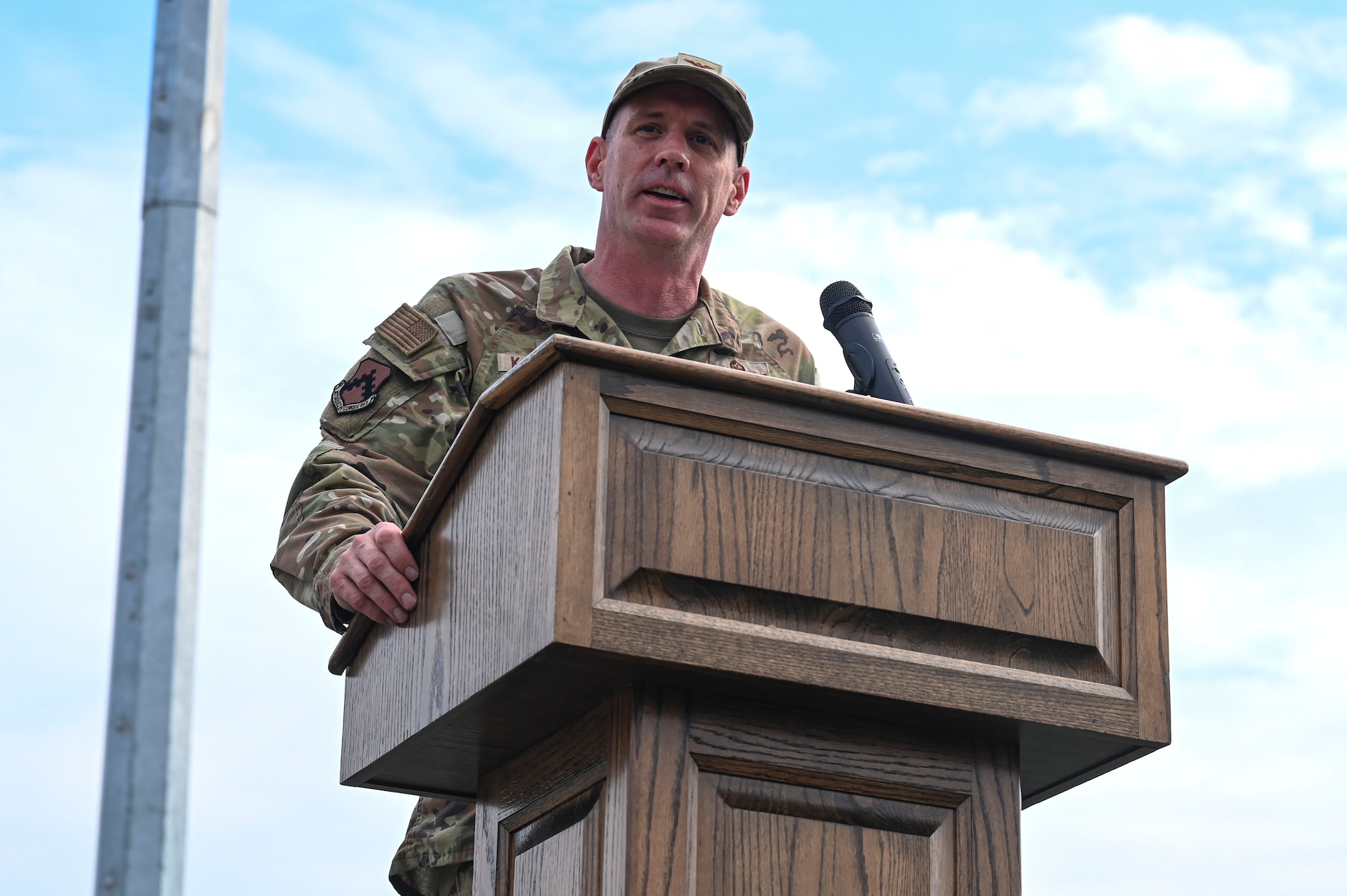 U.S. Air Force Col. Peter Kasarsksis, 8th Fighter Wing commander, provides remarks during the 9/11 Remembrance Ceremony.