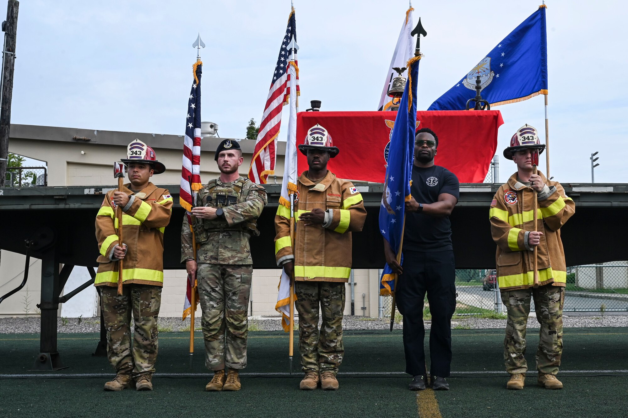 The 8th Fighter Wing Honor Guard presents arms during the 9/11 Remembrance Ceremony.