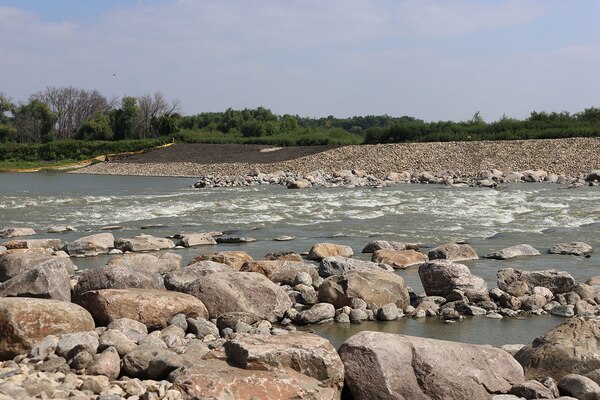 River flowing around rock rapids