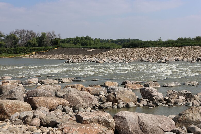 River flowing around rock rapids