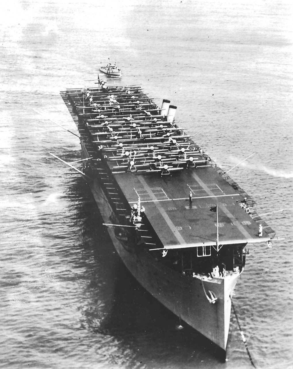 A full flight deck while at anchor at Pearl Harbor, May 1928. There are 34 aircraft on her crowded flight deck, and probably more below.