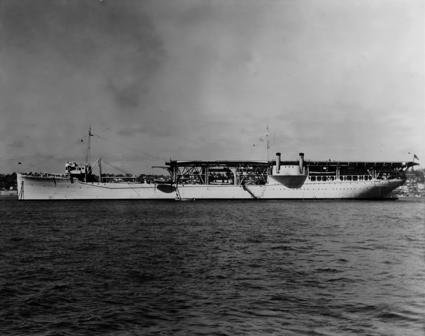 In this 1937 photo, following conversion to a seaplane tender, now-AV-3, the once-“covered wagon”—the Langley’s nickname when she had a full-length flight deck—the Navy’s first carrier is now the “Langley Maru” because of her resemblance to a Japanese aircraft carrier, a strange moniker given future events to come in the next four years.