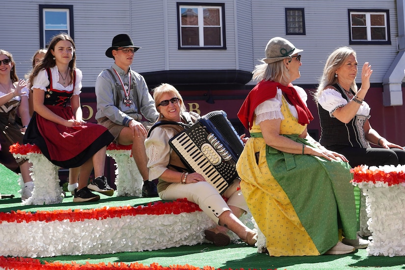 Parade participants wave to onlookers during Chicago’s 58th Annual Von Steuben Parade, September 07, 2024.