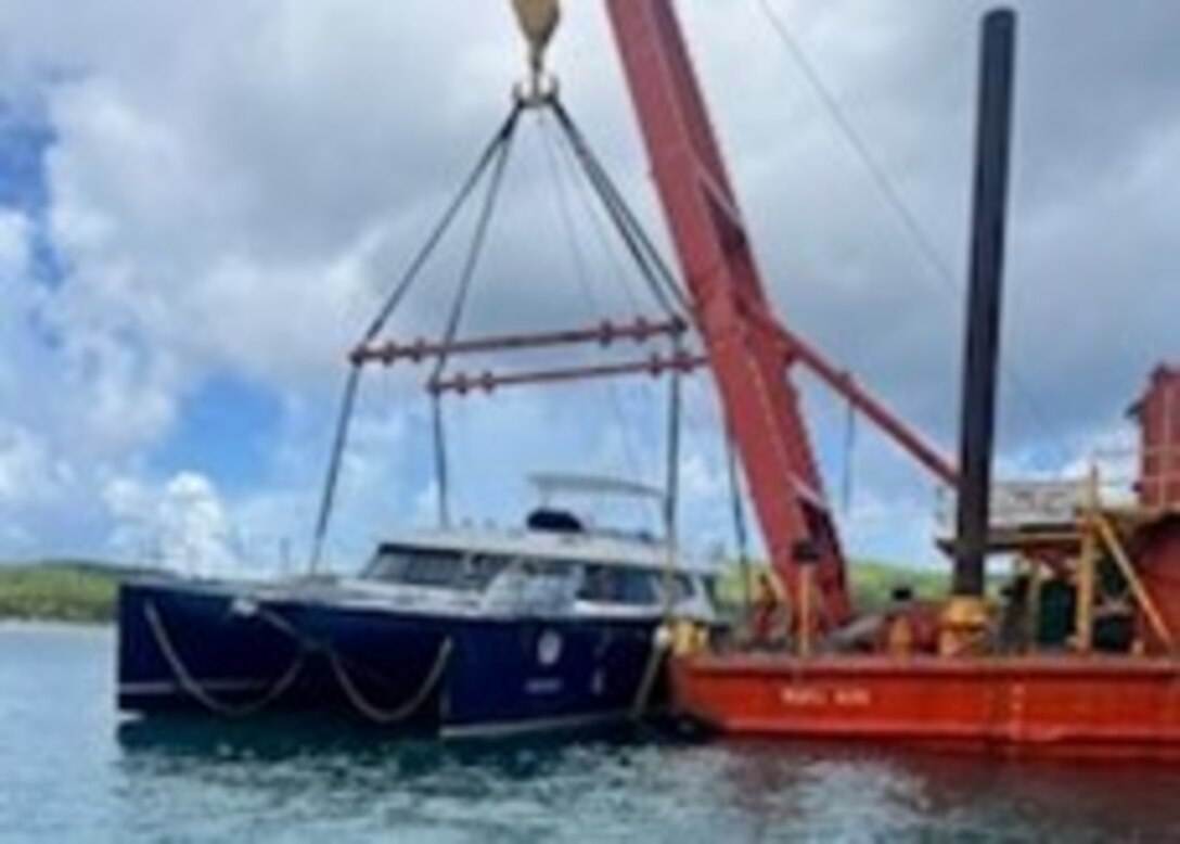 Resolve Marine crews use their 400-ton shear-leg barge to complete the removal of the 72-foot sailing catamaran Obsession from a reef at Flamenco Beach in Culebra, Puerto Rico, Sept. 10, 2024.  Coast Guard Federal On-Scene Coordinator representative for the case announced that Resolve Marine crews will conduct a second lift, Sept. 11, 2024, to load the vessel Obsession to a second barge for transport to the receiving facility at Virgin Gorda, British Virgin Islands. (Courtesy photo)