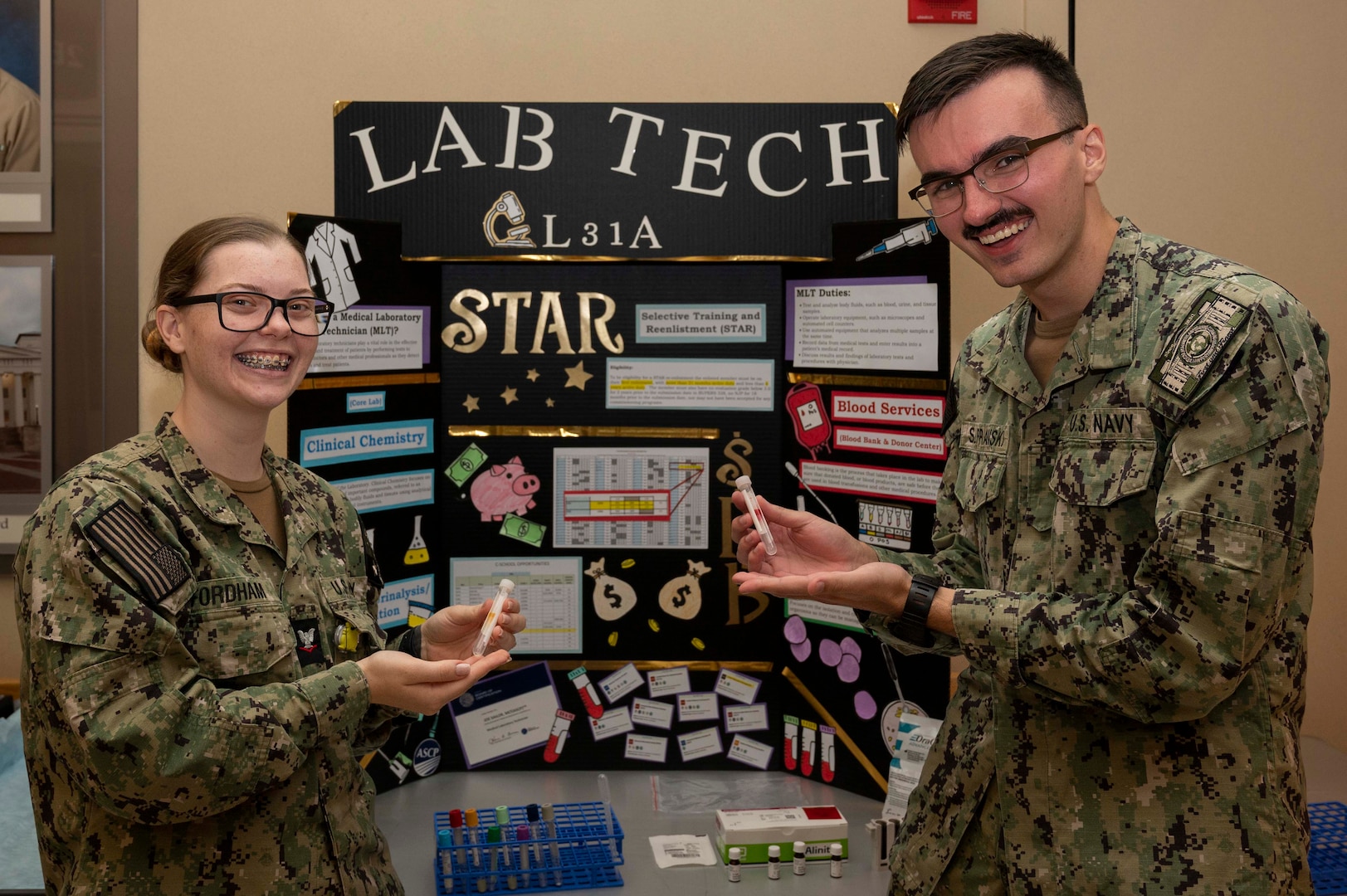 Lab Technicians holing blood vials