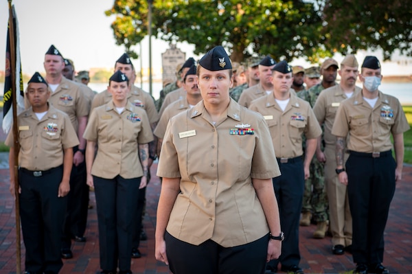 Naval Medical Center Portsmouth (NMCP) active duty and civilian staff members, led by Capt. Brian Feldman, NMCP director/Navy Medicine Readiness and Training Command Portsmouth commander, gathered at Morning Colors to honor the lives lost due to the attacks on the World Trade Center towers, the Pentagon, and the crash of Flight 93 in a Pennsylvania field, 23 years ago, Sept. 11.