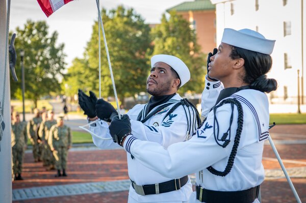 Naval Medical Center Portsmouth (NMCP) active duty and civilian staff members, led by Capt. Brian Feldman, NMCP director/Navy Medicine Readiness and Training Command Portsmouth commander, gathered at Morning Colors to honor the lives lost due to the attacks on the World Trade Center towers, the Pentagon, and the crash of Flight 93 in a Pennsylvania field, 23 years ago, Sept. 11.