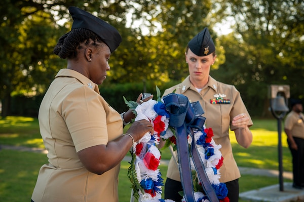 Naval Medical Center Portsmouth (NMCP) active duty and civilian staff members, led by Capt. Brian Feldman, NMCP director/Navy Medicine Readiness and Training Command Portsmouth commander, gathered at Morning Colors to honor the lives lost due to the attacks on the World Trade Center towers, the Pentagon, and the crash of Flight 93 in a Pennsylvania field, 23 years ago, Sept. 11.