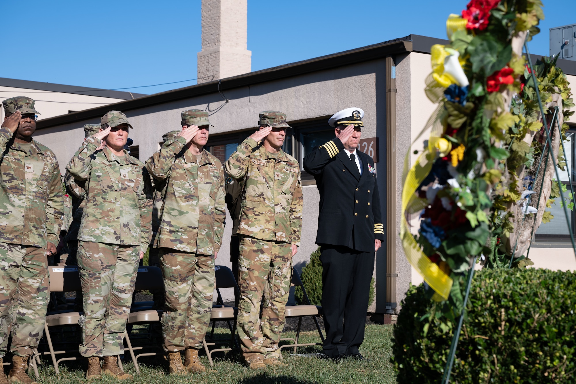 Joint Base McGuire-Dix-Lakehurst senior leaders render a salute during a 9/11 remembrance ceremony at JB MDL, N.J., Sept. 11, 2024. The annual ceremony honors the nearly three thousand lives lost to the terrorist attacks that took place on September 11, 2001. (U.S. Air Force photo by Aidan Thompson)