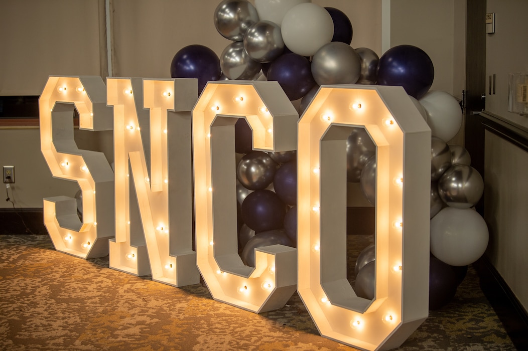 A senior noncommissioned officer (SNCO) sign is displayed at the Valdosta State University Ballroom during a SNCO induction ceremony, Valdosta, Georgia, Sept. 05, 2024. The U.S. Air Force has placed its trust in these experienced and skilled leaders, advancing them to the next level of their careers. (U.S. Air Force photo by Airman 1st Class Iain Stanley)