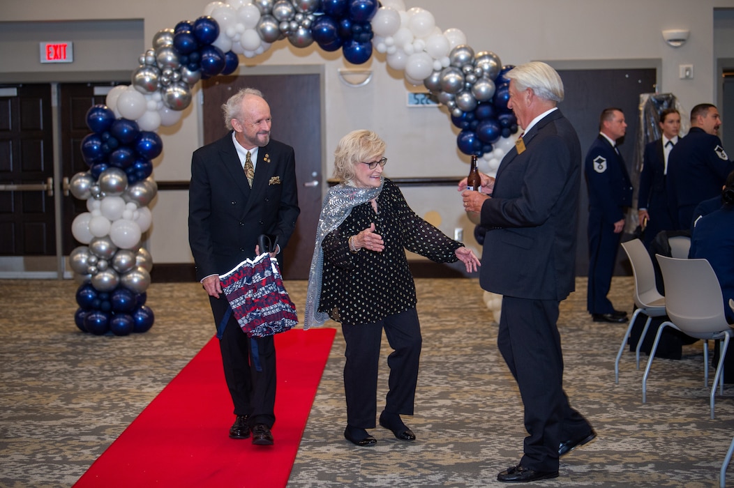 Dr. Lucy Greene greets Mr. Chuck Steele at a senior noncommissioned officer induction ceremony, Valdosta State University Ballroom, Valdosta, Georgia, Sept. 05, 2024. Many important figures from Team Moody and the local community came to congratulate the new senior NCO’s on their accomplishments. (U.S. Air Force photo by Airman 1st Class Iain Stanley)