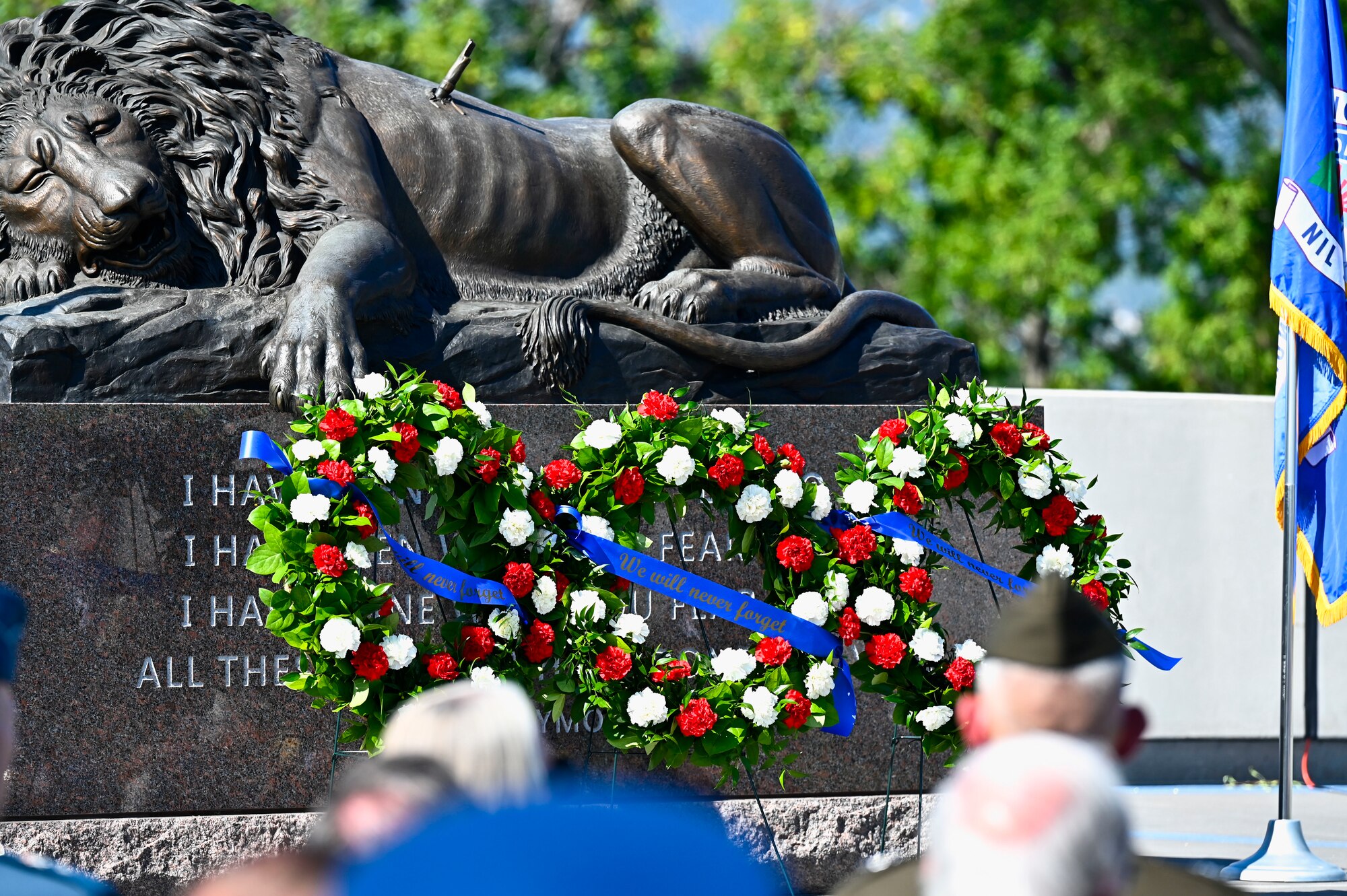 Service and community members attend a remembrance service.