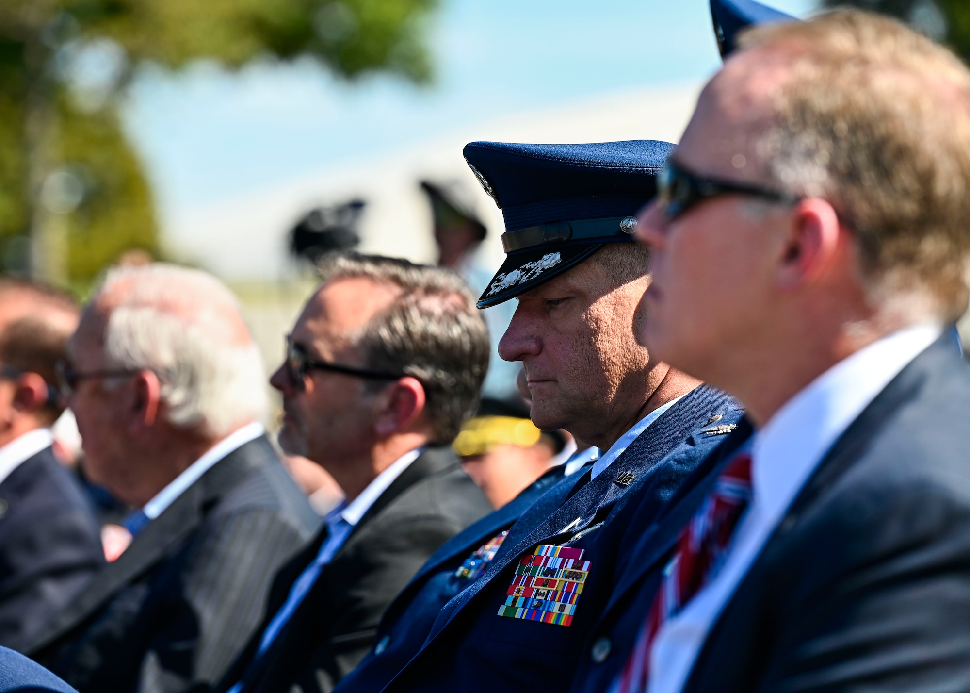 Service and community members attend a remembrance service.