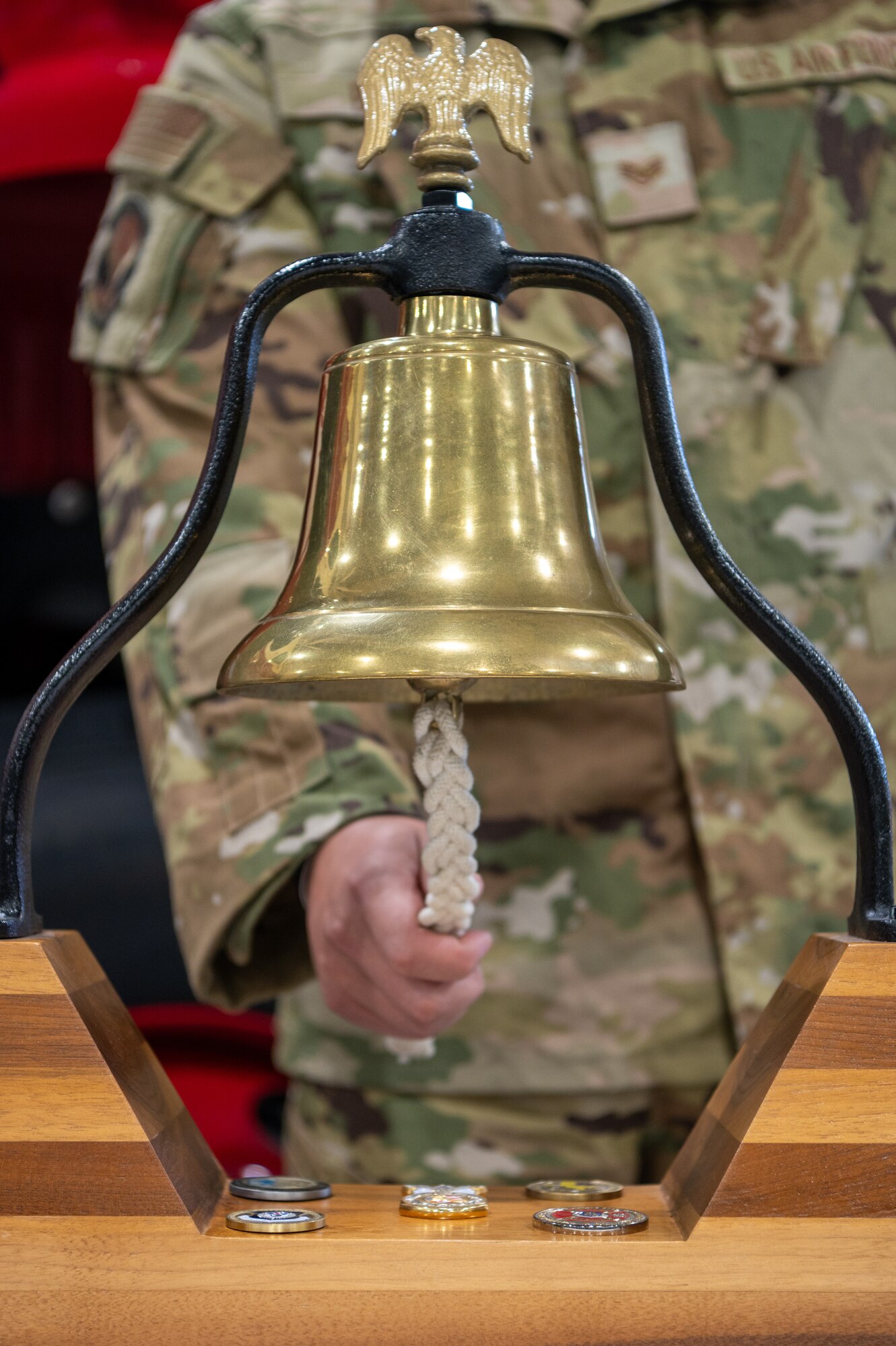 U.S. Air Force Staff Sgt. Dakota Ball, a 1st Special Operations Civil Engineer Squadron firefighter, rings a bell during a 9/11 remembrance ceremony at Hurlburt Field, Florida, Sept. 11, 2024.