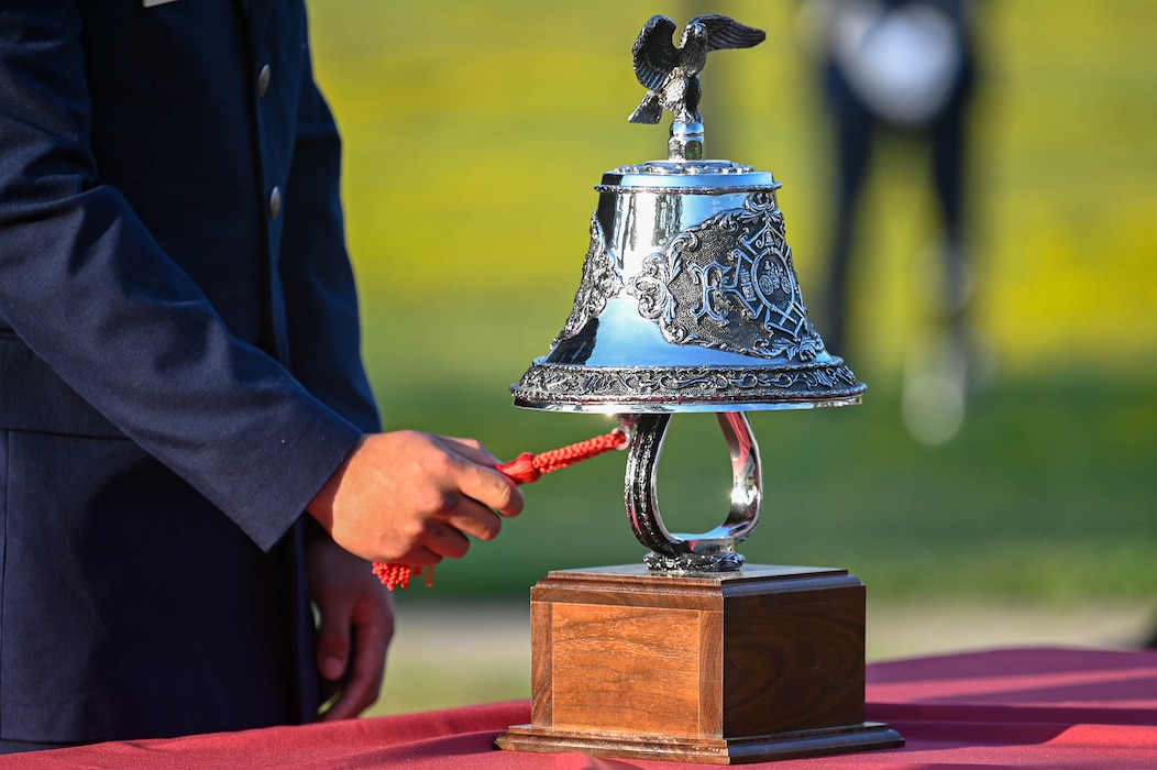 A Team Little Rock Airman rings the ceremonial bell during the 9/11 remembrance ceremony at Little Rock Air Force Base, Arkansas, Sept. 11, 2024. On Sept.11, 2001, the world watched as two jetliners slammed into New York City's World Trade Center while another crashed into the Pentagon in Arlington, Virginia.