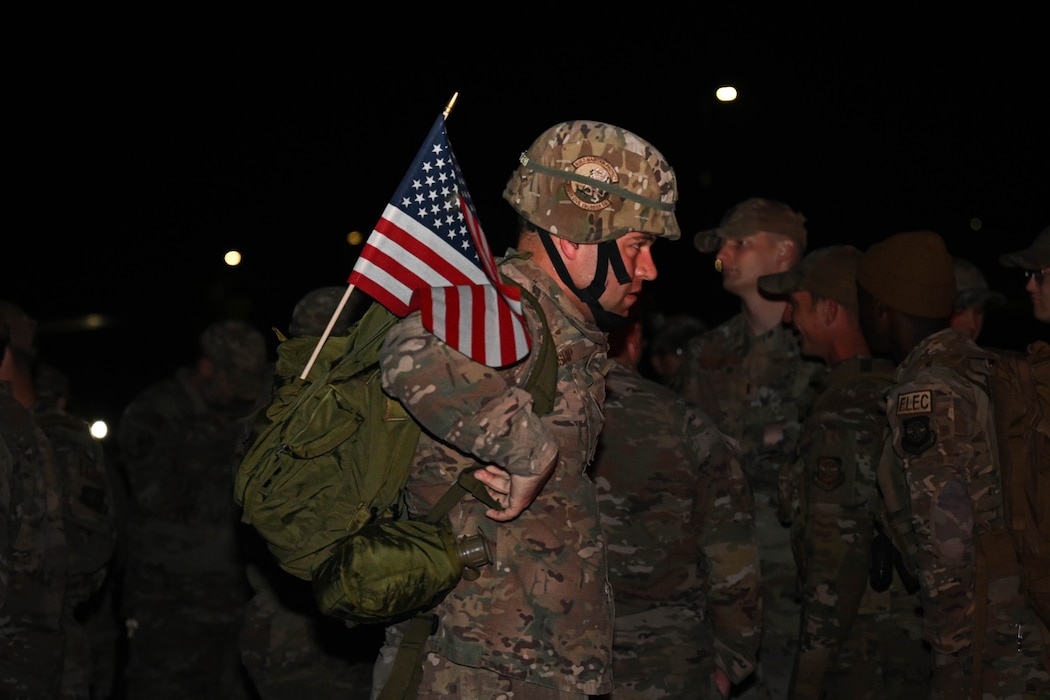 Team Little Rock Airmen prepare for a commemorative ruck march at Little Rock Air Force Base, Arkansas, Sept. 11, 2024. The Sept.11, 2001, terrorist attacks killed 2,977 people and changed the world as we knew it. President George W. Bush led the national response in the uncertain days after the attacks, comforted a grieving nation and demonstrated to the world the strength of American resolve.