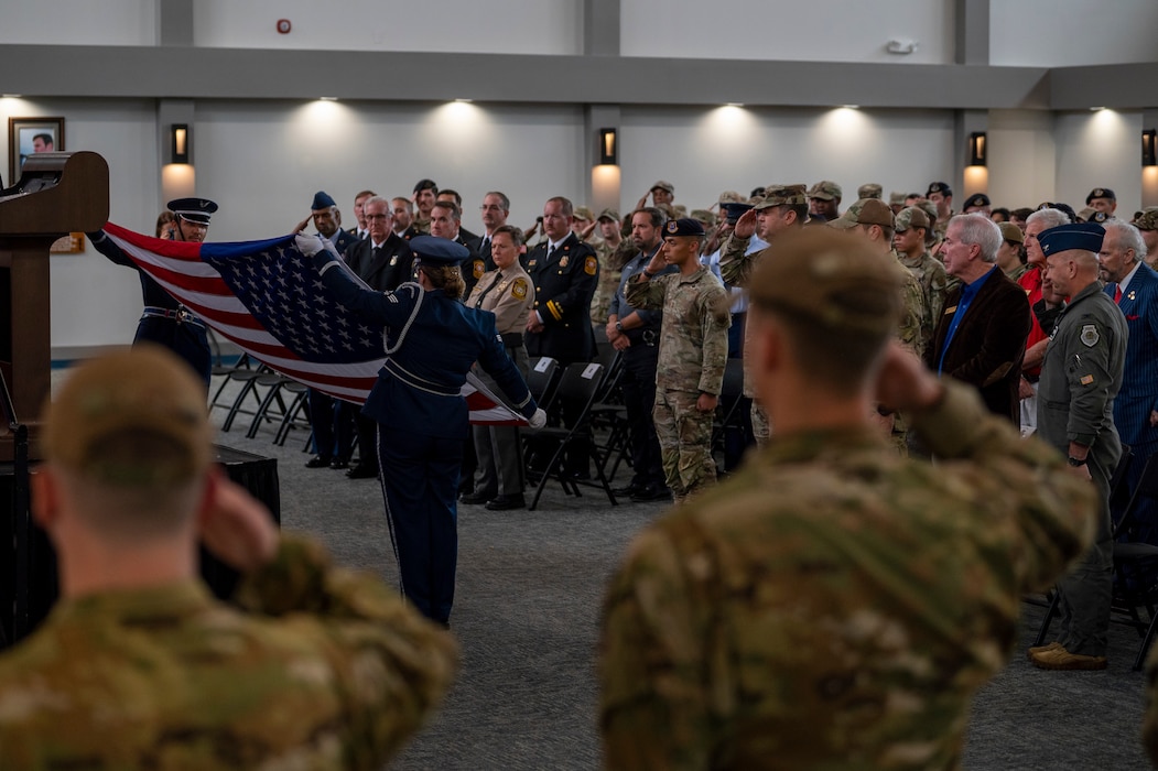 U.S. Air Force Airmen from the Moody Air Force Base honor guard present the American flag in a retirement of colors during a 9/11 remembrance ceremony at Moody Air Force Base, Georgia, Sept. 11, 2024. The ceremony was held to honor the first responders who lost their lives during the Sept. 11, 2001, terrorist attacks. (U.S. Air Force photo by Senior Airman Leonid Soubbotine)