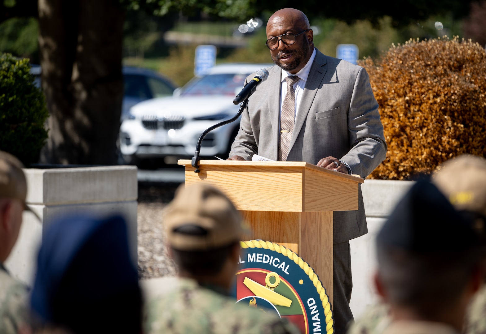 Retired U.S. Navy Master Chief Clinton Garrett serves as the guest speaker during a 9/11 remembrance observance held on September11, 2024 in front of the historic Tower at Walter Reed National Military Medical Center (Walter Reed).