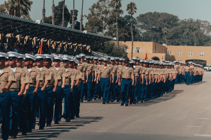 U.S. Marines with Kilo Company, 3rd Recruit Training Battalion, march in formation during a graduation ceremony at Marine Corps Recruit Depot San Diego, California, Sept. 6, 2024.  This ceremony marked the end of a 13-week transformation that included training in drill, marksmanship, basic combat skills, and Marine Corps customs and traditions. (U.S. Marine Corps photo by Cpl. Alexander O. Devereux)