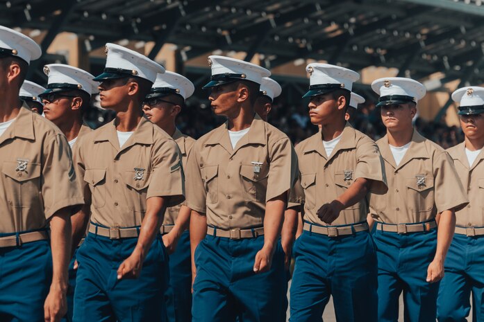 U.S. Marines with Kilo Company, 3rd Recruit Training Battalion, march in formation during a graduation ceremony at Marine Corps Recruit Depot San Diego, California, Sept. 6, 2024.  This ceremony marked the end of a 13-week transformation that included training in drill, marksmanship, basic combat skills, and Marine Corps customs and traditions. (U.S. Marine Corps photo by Cpl. Alexander O. Devereux)