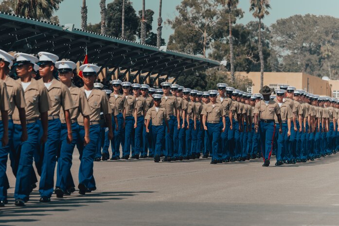 U.S. Marines with Kilo Company, 3rd Recruit Training Battalion, march in formation during a graduation ceremony at Marine Corps Recruit Depot San Diego, California, Sep. 6, 2024. This ceremony marked the end of a 13-week transformation that included training in drill, marksmanship, basic combat skills, and Marine Corps customs and traditions. (U.S. Marine Corps photo by Cpl. Alexander O. Devereux)