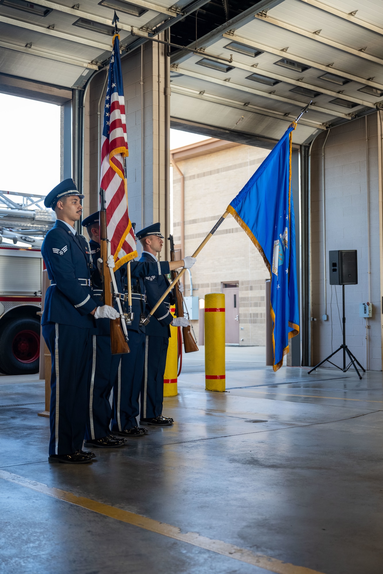 The 22nd Air Refueling Wing Honor Guard presents the colors during the Patriot Day Ceremony at McConnell Air Force Base, Kansas, Sept. 11, 2024. The ceremony was held to honor the lives lost in the wake of the tragic events that happened on Sept. 11, 2001. (U.S. Air Force photo by Senior Airman Felicia Przydzial)