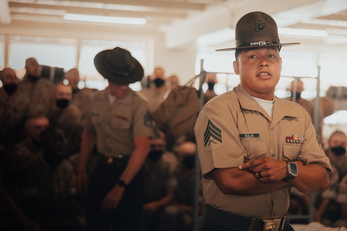 U.S. Marine Corps Sgt. Jamie Solis, a drill instructor with Golf Company, 2nd Recruit Training Battalion, gives instructions to new recruits on pick up day, at Marine Corps Recruit Depot San Diego, California, Sep. 7, 2024. Pick up day signifies the first day of training in which recruits meet their drill instructor team for the first time, prepare their gear and squad-bay, and expectations are set for the remainder of their time in recruit training. (U.S. Marine Corps photo by Cpl. Alexander O. Devereux)