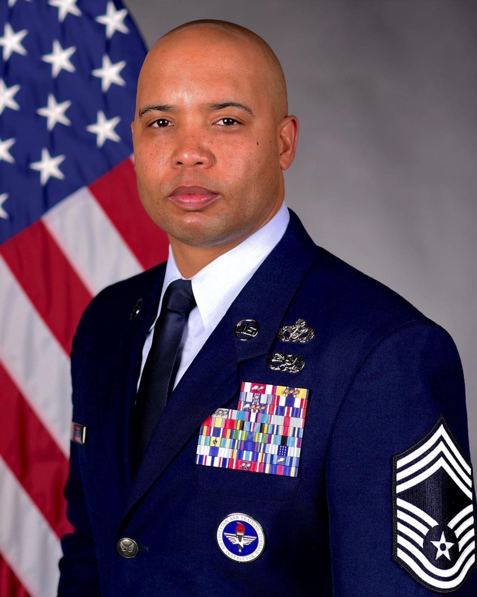 Service-member poses for a portrait.