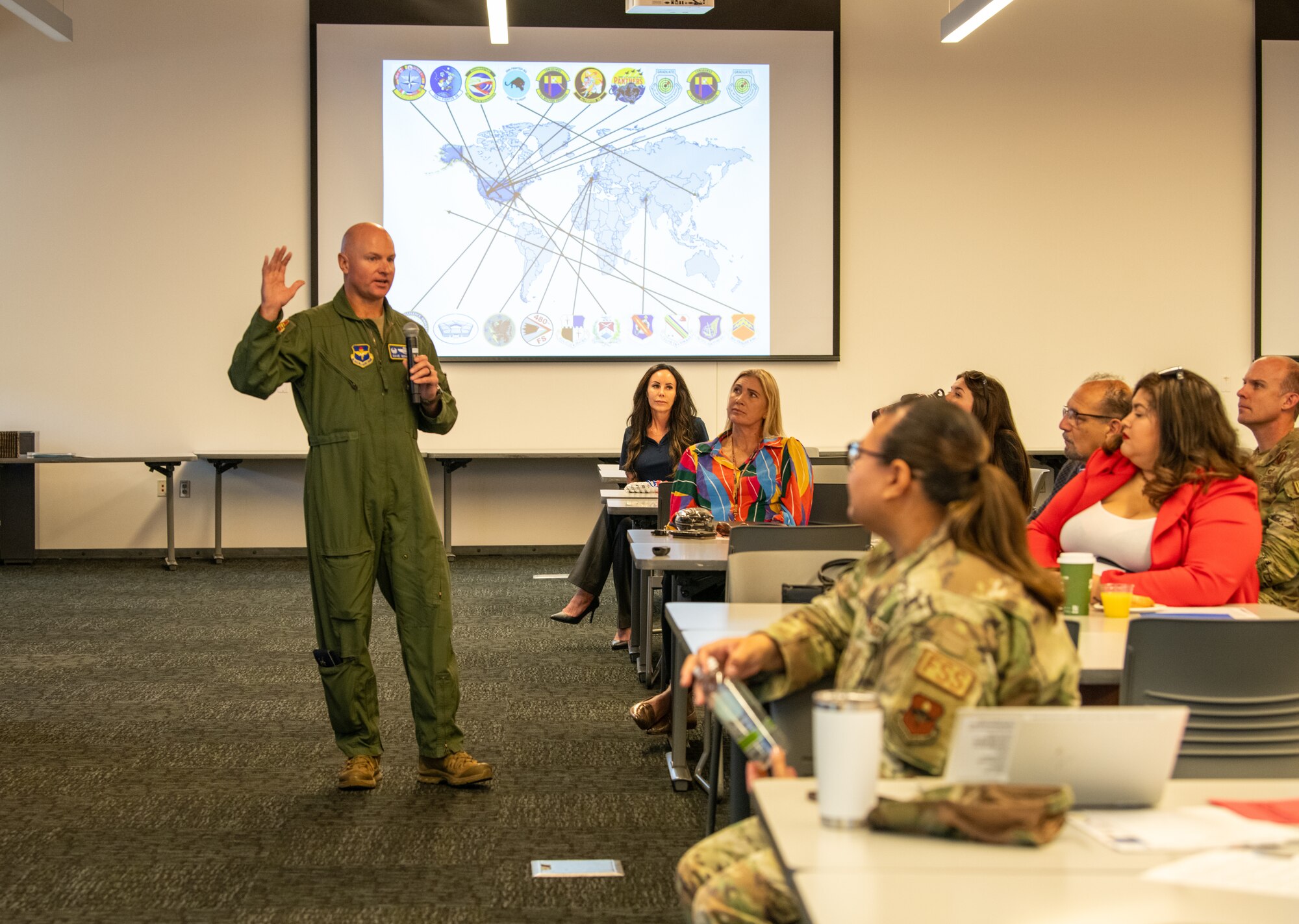 U.S. Air Force Col. David Berkland (left), 56th Fighter Wing commander, speaks during the Air Force Community Partnership Program meeting at Estrella Mountain Community College, Avondale, Arizona, Sept. 10, 2024.