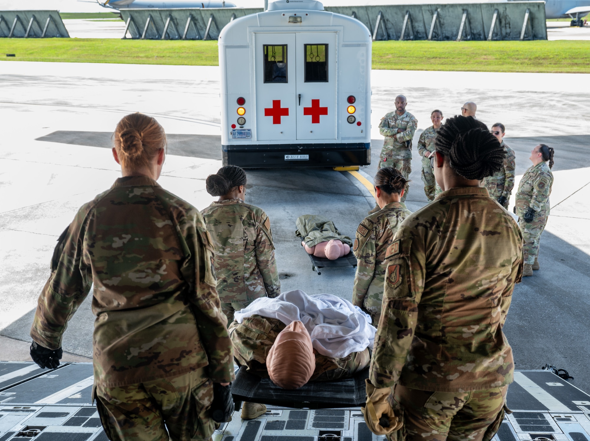 U.S. Air Force Airmen from the 36th Medical Group exercises offloading simulated patients from a C17 Globemaster III from the 437th AirLift Wing Joint Base Charleston, South Carolina, on Andersen Air Force Base, Guam, Sep. 06, 2024. This training ensures readiness for global mobility, responding to humanitarian or wartime needs to protect lives. (U.S. Air Force photo by Airman 1st Class Manasseh Demissie)
