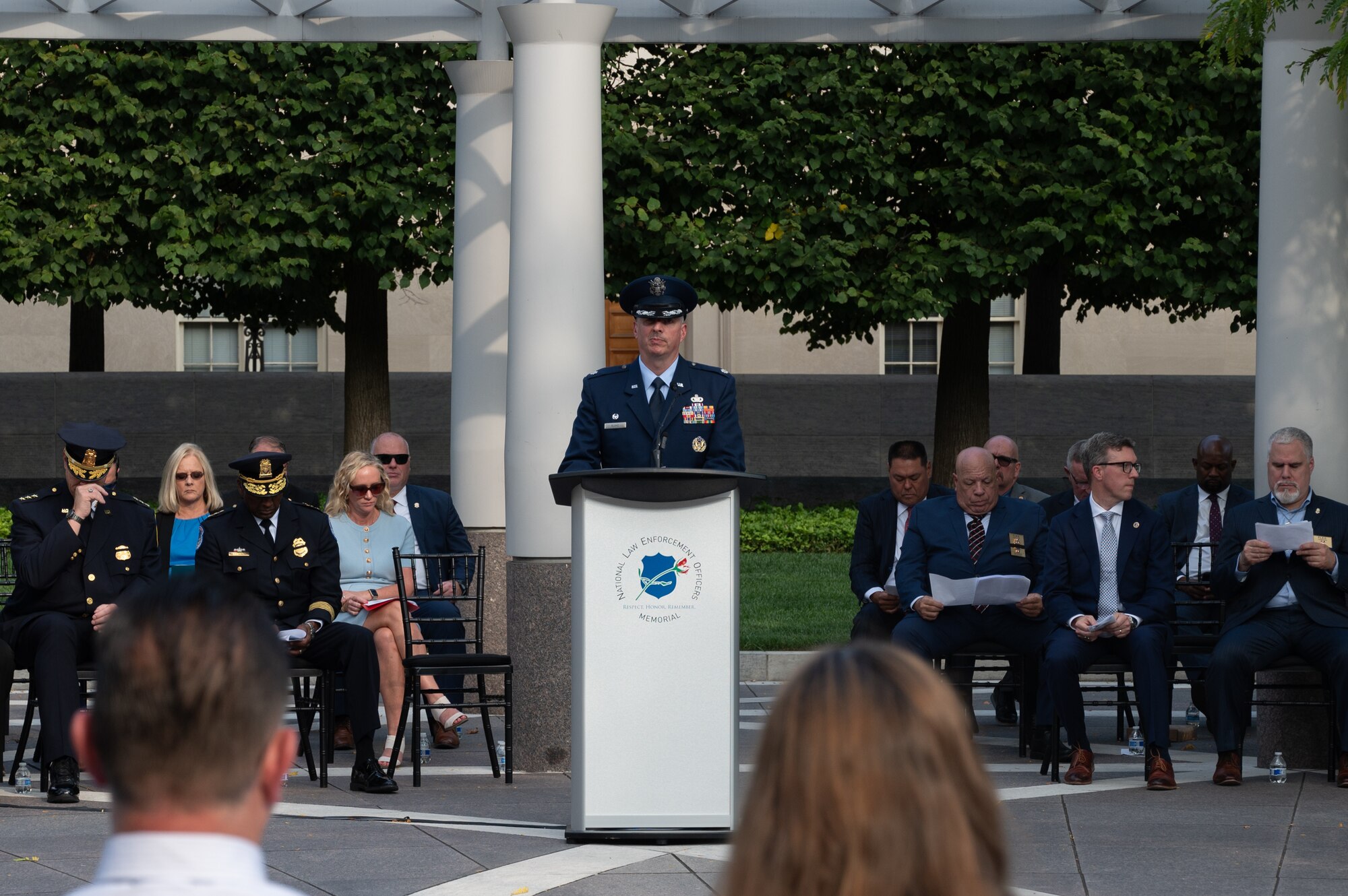 Lt. Col. Matthew Blake, an OSI Reservist currently serving as the 7th Field Investigations Squadron commander, reads a portion of fallen police officer names during a 9/11 ceremony held at the National Law Enforcement Officers Memorial in Washington, D.C., Sept. 11, 2024.