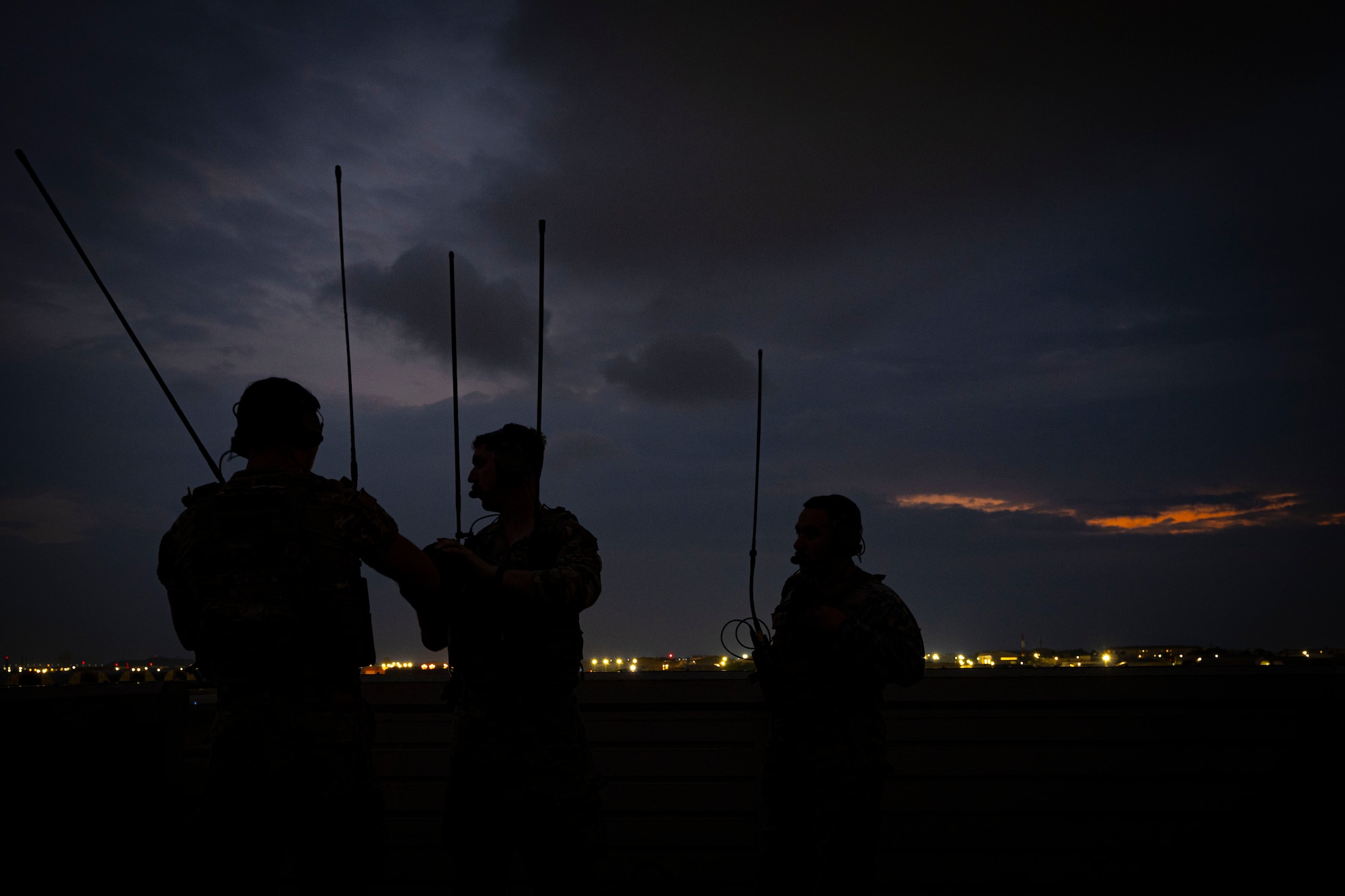 U.S. Air Force Tech Sgt. Tyler Twilley, left, 8th Operations Support Squadron radar approach control, U.S. Air Force Tech. Sgt. Jacob Spillman, center, 8th OSS tower watch supervisor, and U.S. Marine Corps Sgt. Alex Ramirez, right, 8th OSS air traffic controller, conduct air traffic control operations at Kunsan Air Base, Republic of Korea.
