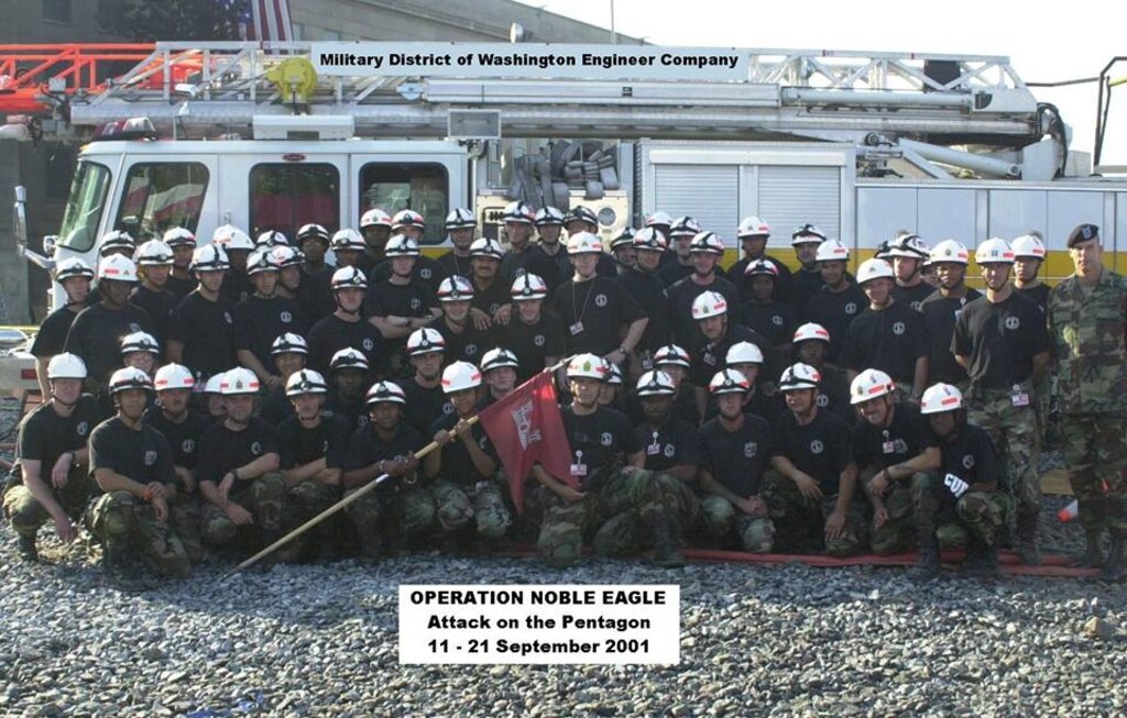 Retired Col. Aaron Barta, then a company commander with the Military District of Washington Engineer Company, second row standing, second from right, poses for a picture with his unit in September 2001. The unit was responsible for responding to recovery efforts following the Sept. 11, 2001, attack on the Pentagon in Washington D.C.