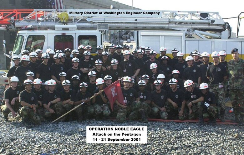Retired Col. Aaron Barta, then a company commander with the Military District of Washington Engineer Company, second row standing, second from right, poses for a picture with his unit in September 2001. The unit was responsible for responding to recovery efforts following the Sept. 11, 2001, attack on the Pentagon in Washington D.C.