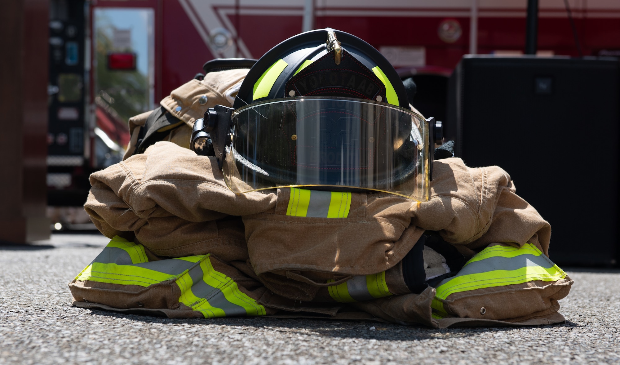 Yokota Fire Department Protective gear sit on display at the 9/11 Memorial Tower Run