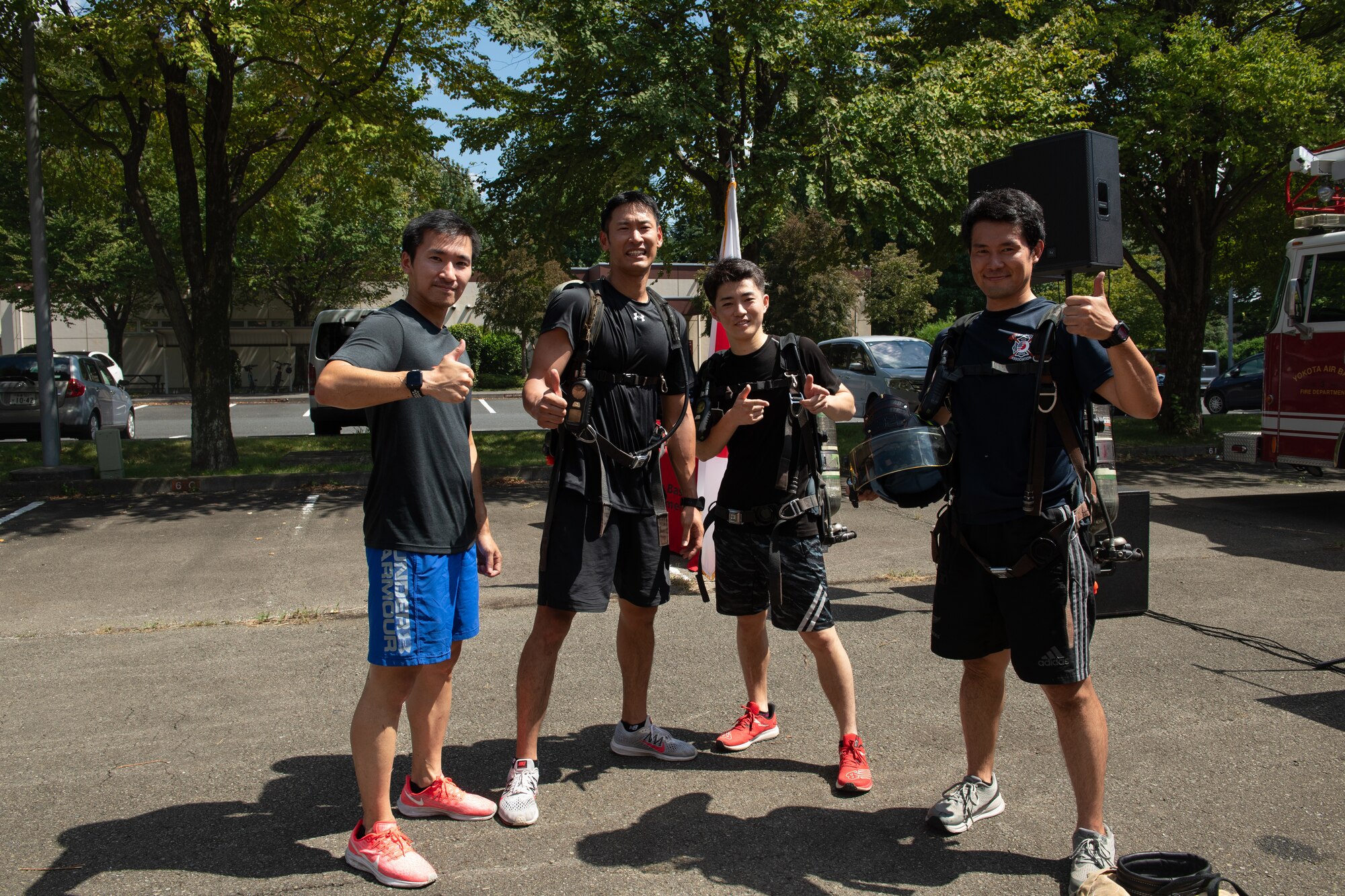 A group of Akishima Fire Department members pose for a photo after the 9/11 Memorial Tower Run