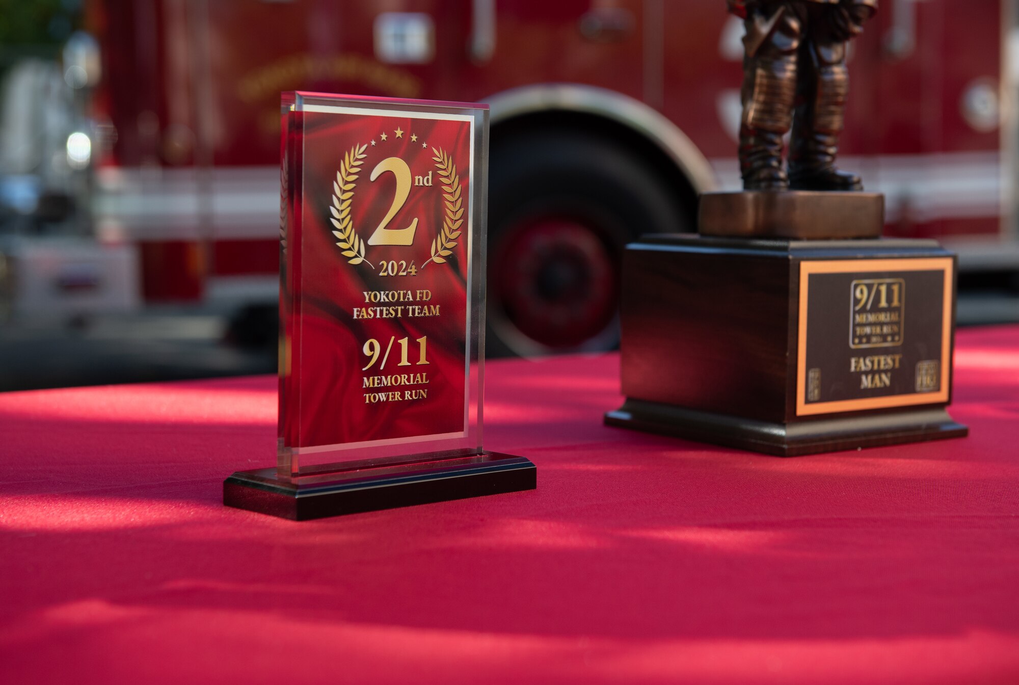 9/11 Memorial Tower Run awards are displayed on a table