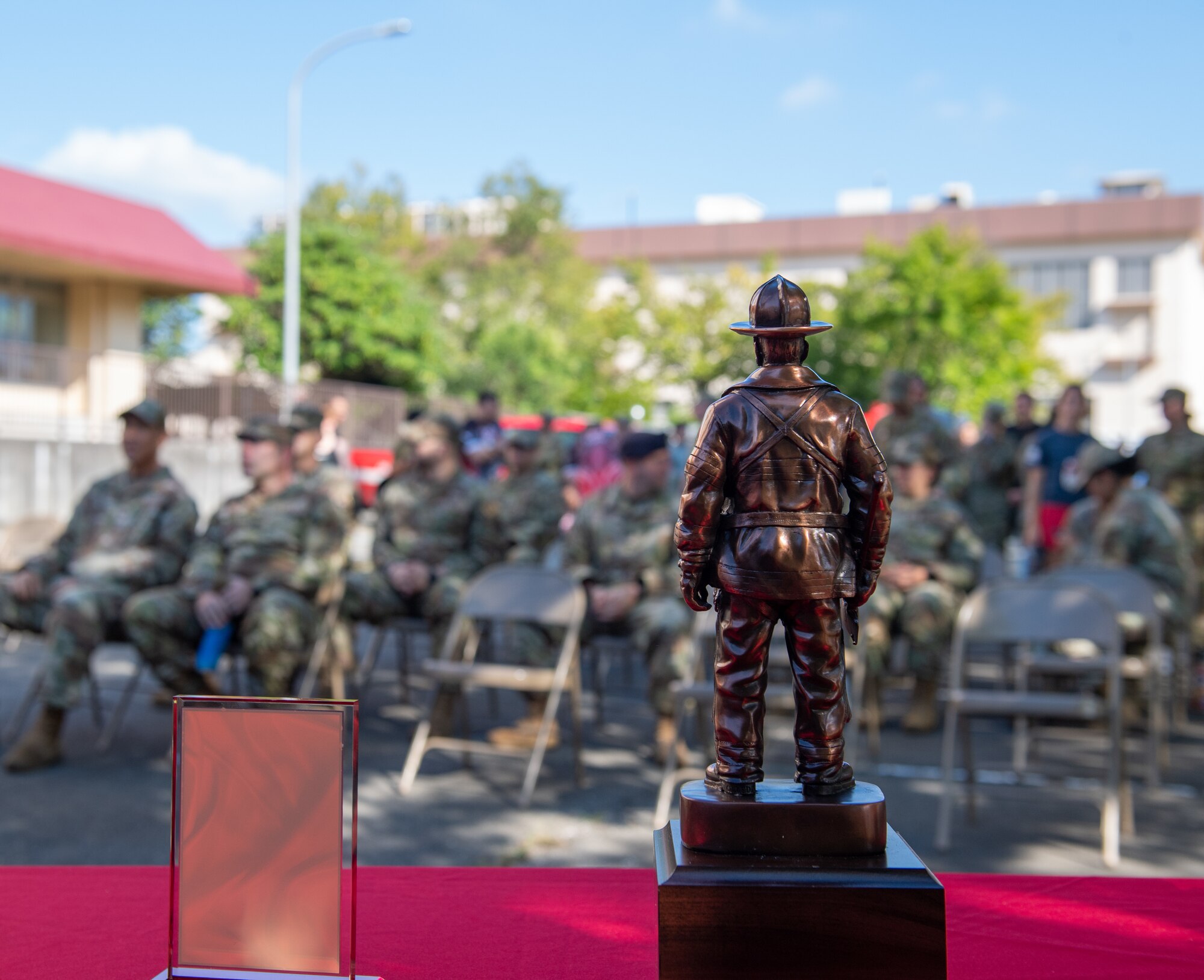 9/11 Memorial Tower Run awards are displayed on a table.