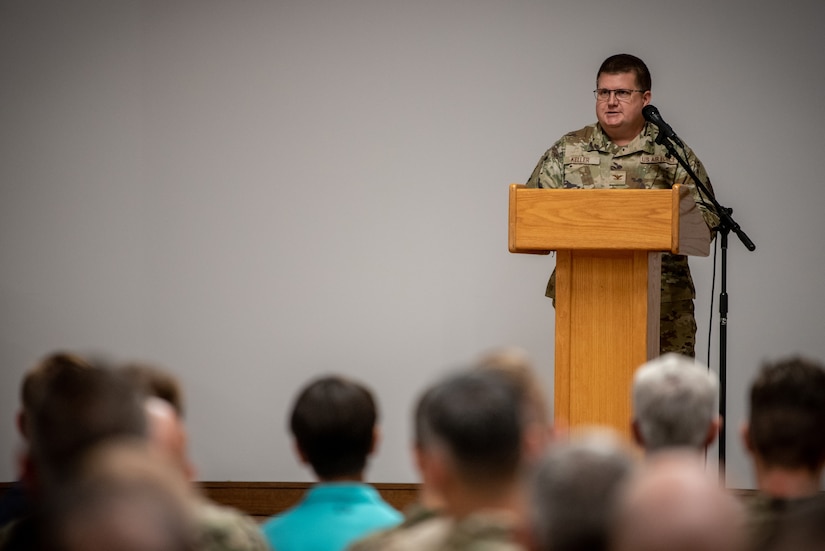 Col. Shawn Keller, outgoing commander of the 123rd Mission Support Group, speaks during a change-of-command ceremony for the unit at the Kentucky Air National Guard Base in Louisville, Ky., July 21, 2024. Assuming command of the group is Lt. Col. Kevin Krauss, former deputy commander of the 123rd Contingency Response Group. (U.S. Air National Guard photo by Master Sgt. Joshua Horton)