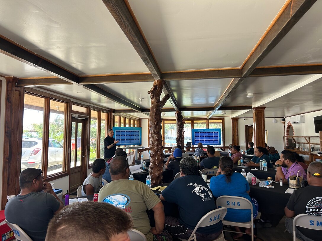 Dee Cruz from the Emergency Management team provides instruction during a disaster preparedness and response workshop, and an introduction to the Incident Command System (ICS) to local government and NGO agencies peers in Yap, Federated States of Micronesia, from Sept. 4, 2024. The effort focused on the activation, staffing, organization, deactivation, and demobilization of an Emergency Operations Center (EOC), offering Yapese partners crucial insights into managing disaster response. (U.S. Coast Guard photo by Lt. Anna Maria Vaccaro)