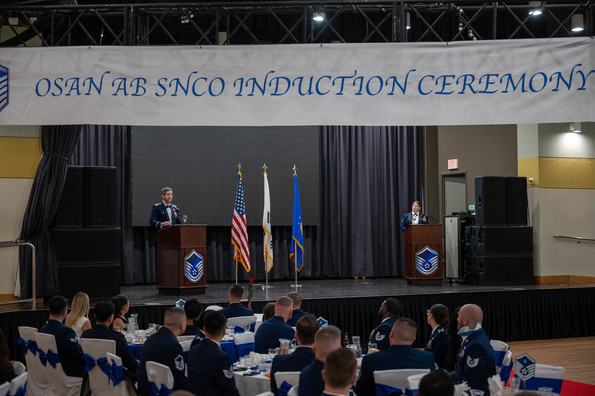 U.S Air Force Col. William McKibban, 51st Fighter Wing commander, speaks to attendees during the Senior Non-Commissioned Officer Induction Ceremony at Osan Air Base, Republic of Korea, Sept. 6, 2024. The induction ceremony marks the inductees recognition, leadership and greater responsibility. (U.S. Air Force photo by Staff Sgt. Christopher Tam)