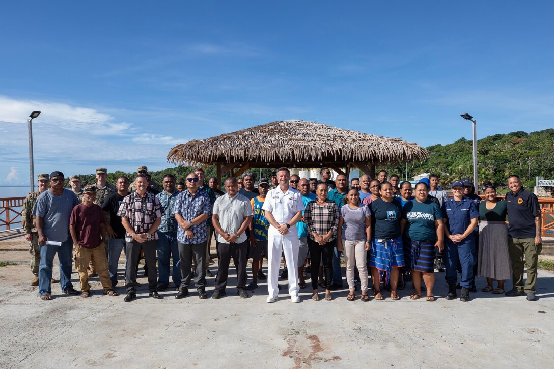 YAP, Federated States of Micronesia (Sept. 4, 2024) – U.S. Navy Capt. Daniel Keeler, Pacific Partnership 2024-2 (PP24-2) mission commander, poses in a group photo with members of an emergency operations training workshop as part of the humanitarian aid and disaster relief line of effort for PP24-2 in Yap, Federated States of Micronesia, Sept. 4, 2024. Now in its 20th iteration, the Pacific Partnership series is the U.S. Navy’s largest annual multinational humanitarian assistance and disaster relief preparedness mission conducted in the Indo-Pacific. Pacific Partnership works collaboratively with host and partner nations to enhance regional interoperability and disaster response capabilities, increase security and stability in the region, and foster new and enduring friendships in the Indo-Pacific. (U.S. Navy photo by Mass Communication Specialist 1st Class Ryan D. McLearnon/Released)