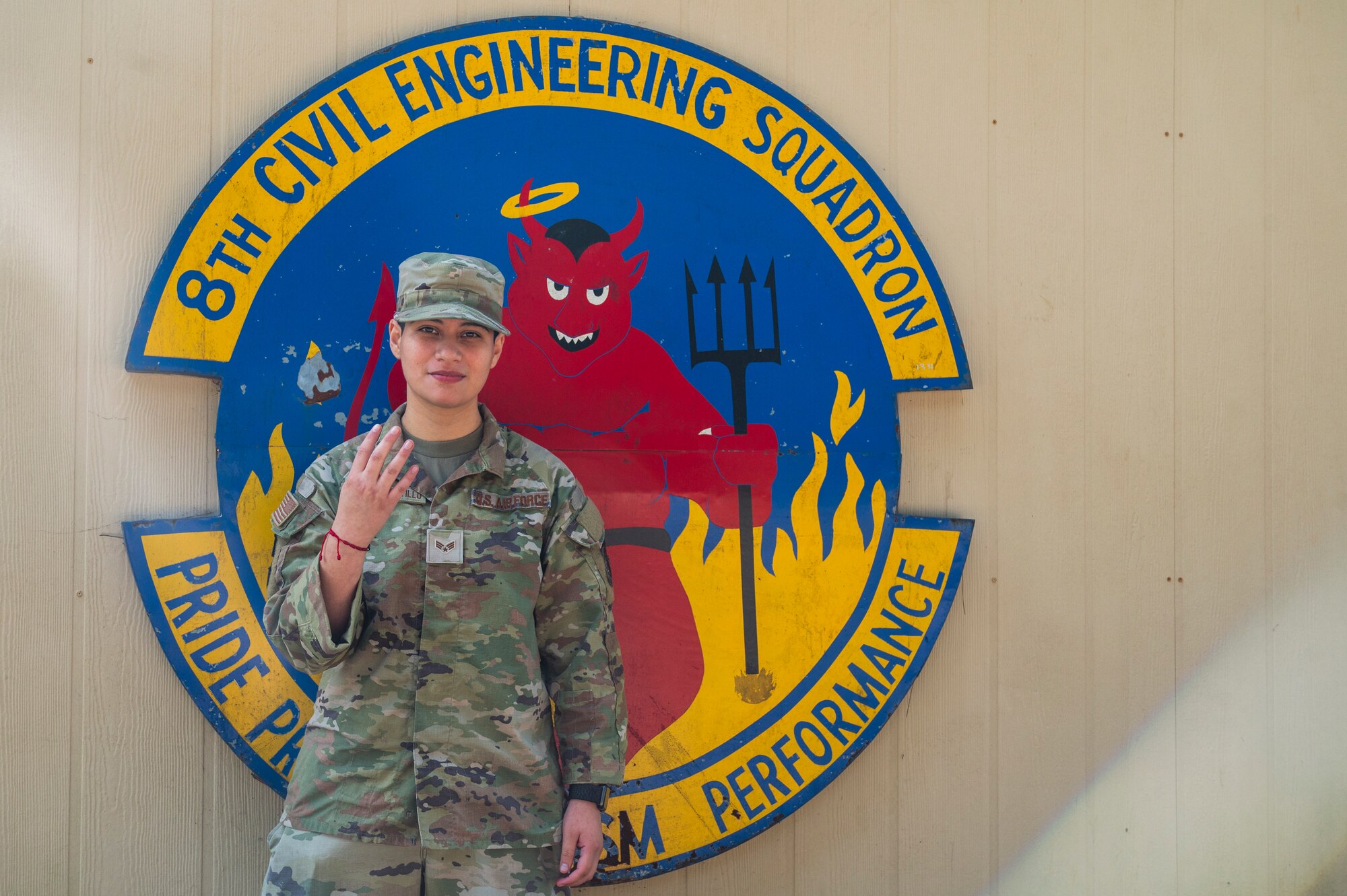 Senior Airman Adrianna Vizcardo-Castillo, 8th Civil Engineer Squadron commander support staff technician, poses for a photo.