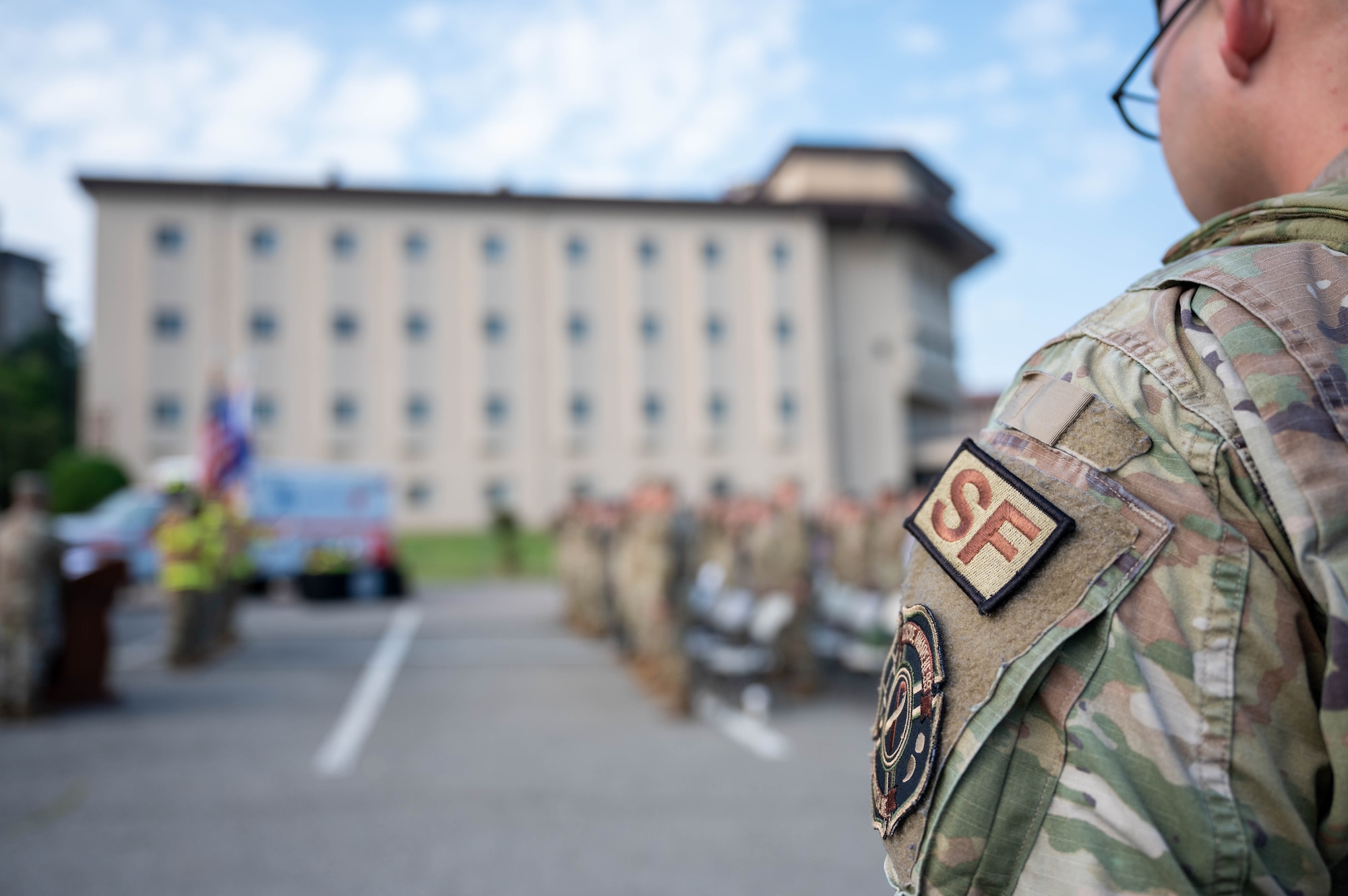 A security forces patch is displayed during a 9/11 remembrance ceremony at Osan Air Base, Republic of Korea, Sept. 11, 2024. Numerous first responders were deployed during 9/11 including members from the New York City Fire Department, New York City Police Department and Port Authority Police Department in an effort to aid the attack. (U.S. Air Force photo by Staff Sgt. Christopher Tam)