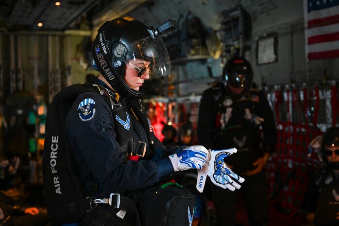 A U.S. Air Force Wings of Blue parachute team member prepares for a jump during Misawa Air Fest 2024 at Misawa Air Base, Japan, Sept. 8, 2024.