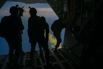 U.S. Air Force Wings of Blue parachute team members prepare to jump from a C-130 Hercules during Misawa Air Fest 2024 at Misawa Air Base, Japan, Sept. 8, 2024.