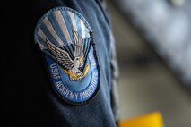 A member of the U.S. Air Force Academy's aerial demonstration team, Wings of Blue, prepares to conduct a parachute jump at Misawa Air Base, Japan, Sept. 8, 2024.