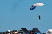 A member of the U.S. Air Force Wings of Blue parachute team prepares to land during Air Fest 2024, at Misawa Air Base, Japan, Sept. 8, 2024.