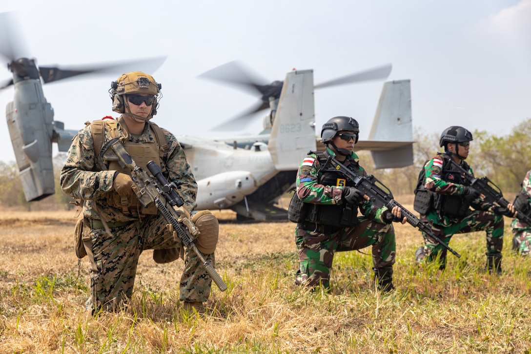 U.S. Marines with Alpha Company, 1st Battalion, 1st Marine Regiment, 1st Marine Division, and members of the Indonesian National Armed Forces hold security during on and off drills as part of Super Garuda Shield 2024 near Surabaya, East Java, Indonesia, Sept. 2, 2024. Super Garuda Shield is an annual exercise that has significantly grown in scope and size since 2009. Super Garuda Shield 24 is the third consecutive time this exercise has grown into a combined and joint event, focused on commitment to partnership and a free and open Indo-Pacific. (U.S. Marine Corps photo by Cpl. Migel A. Reynosa)